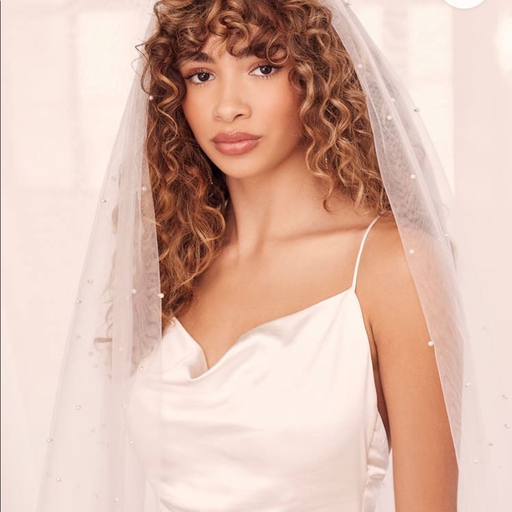 Brand new unused wedding veil with pearl accents